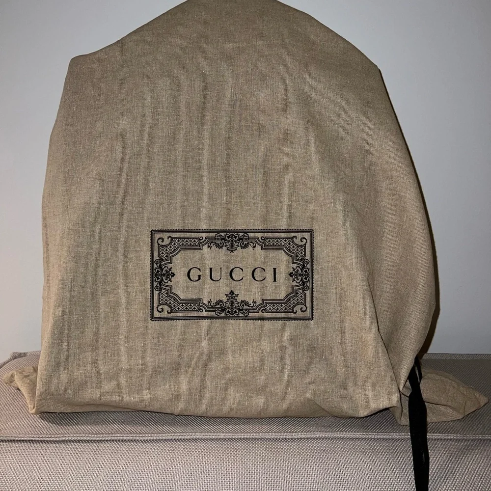 Gucci black rubber